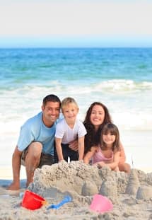 Radiant family at the beach